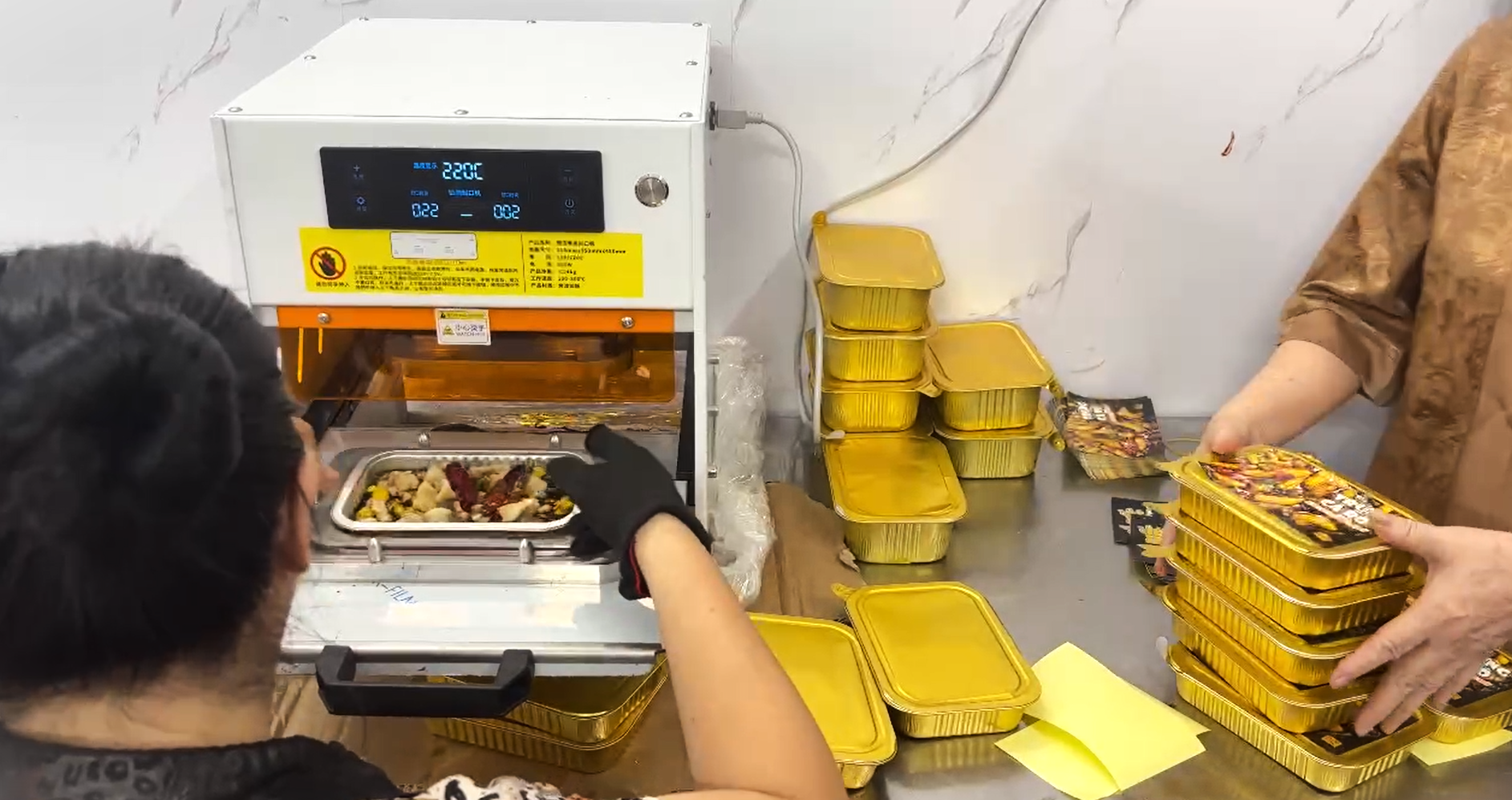 Máy ép seal khay nhôm thực phẩm